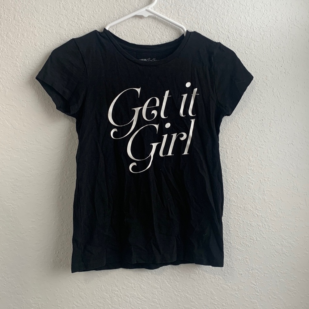 All black T-shirt with words on the front from express